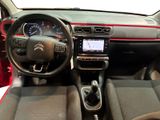 a picture of a car dashboard with a steering control