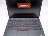 the lenovo laptop is open and ready to be used