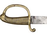 an old sword with a gold handle on a white background