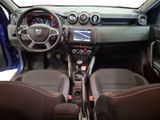 a picture of a car interior with a steering wheel and dashboard