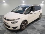 the white van is parked on a checkered floor in a garage