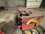 a machine that is sitting in a garage