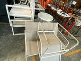 a lot of chairs and tables that are in a warehouse