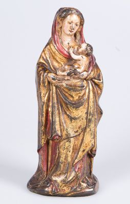 a statue of a woman holding a baby in her arms