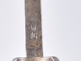 a knife that is sitting on top of a table