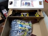 a box with a bunch of toys inside of it