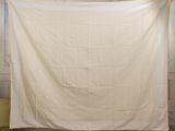 an image of a white blanket hanging in a room