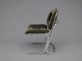 an image of a chair with a green seat on a grey background