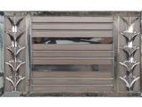 a metal door that has a glass panel on it