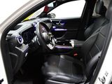 a picture of the inside of a car with the door open