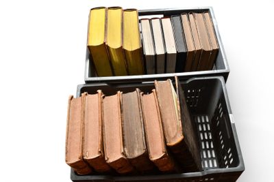 a lot of books that are sitting in the bins