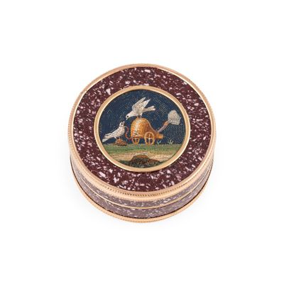 a small round box with a picture of a dog and a house