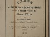 an open book with a drawing of a bird on it ' s cover
