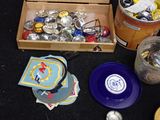 a box full of beer cans and other items on a table
