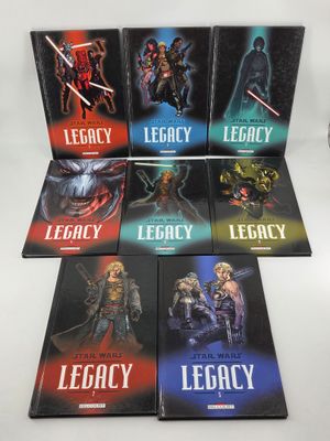a bunch of books that are sitting on top of a table