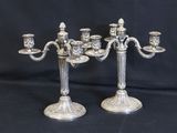 pair of antique silver plated candelabs with candles