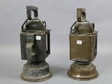 two metal objects that are sitting next to each other