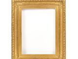 a gold frame on a white wall with a white background