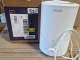 an image of a box with a white humider and a white cord