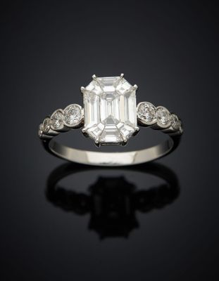 an emerald and diamond ring