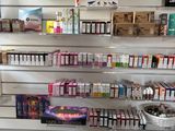many different types of cigarettes on the shelves in the store