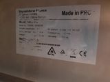 a sign on the side of a refrigerator that says made in frp