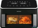 a close up of an air fryer with a chicken in it