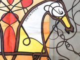a painting of a horse with a man riding on it