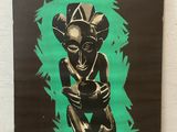 a black and green poster of a woman holding a baby