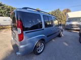 a blue van that is parked in the parking lot