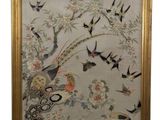 painting of birds and flowers in a gold frame on a white background