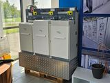 une photo présentant un présentoir d'appareils électriques dans un magasin