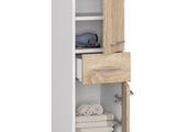 un gros plan d'une armoire avec un tiroir et des serviettes
