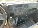 a dashboard of a vehicle with a steering control