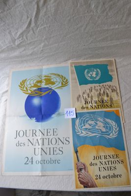 a table with a bunch of posters on it