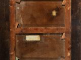 a wooden cabinet with a glass door in it