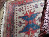 a rug on the floor in a living room
