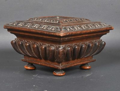 an old wooden box sitting on top of a wooden stand