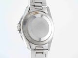 an image of a close up of a wrist watch on a white surface