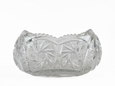 a clear glass bowl with a decorative design on it
