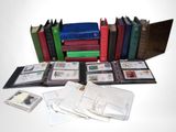 a lot of books and envelopes sitting on a table