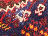an image of a close up of a colorful oriental rug