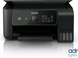 a black printer sitting on top of a white surface