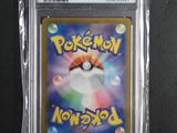 a close up of a pokemon card in a plastic case