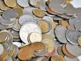 a pile of coins sitting on top of a table