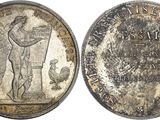 a close up of a coin with an image of a man on it