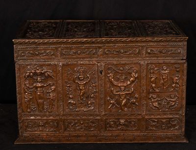 an antique wooden chest with carvings and carvings on the sides