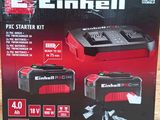une boîte contenant une batterie et un chargeur