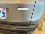 a close up of a car with a sticker on the back of it