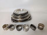 a stack of silver rings sitting on top of each other
